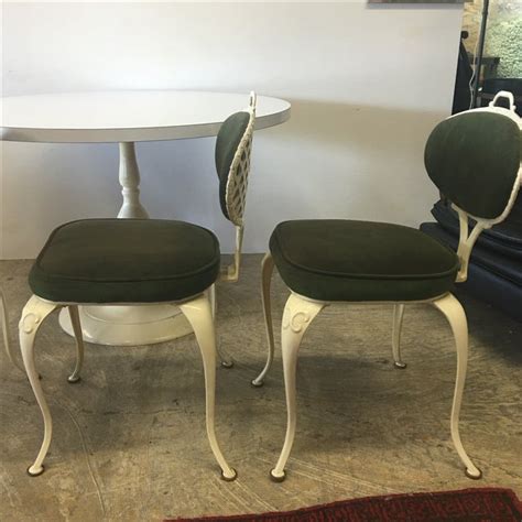 Clean lines, compass feet, these chairs are perfect for a restaurant or bistro with vintage and trendy decor. Mid Century Thinline Bistro Patio Set | Chairish