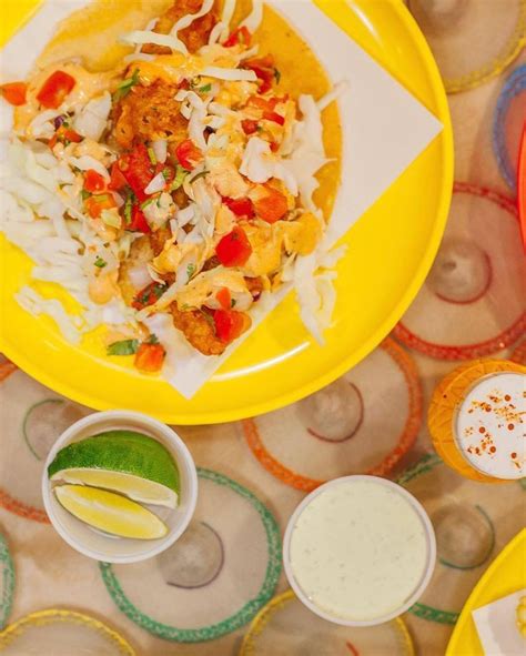 This tiny downtown taco stop boasts a menu created by chef eddie ruiz, and is as downtown's chicas tacos, now open in a parking lot. Baja Fish Taco at Downtown location. Mention that tables ...