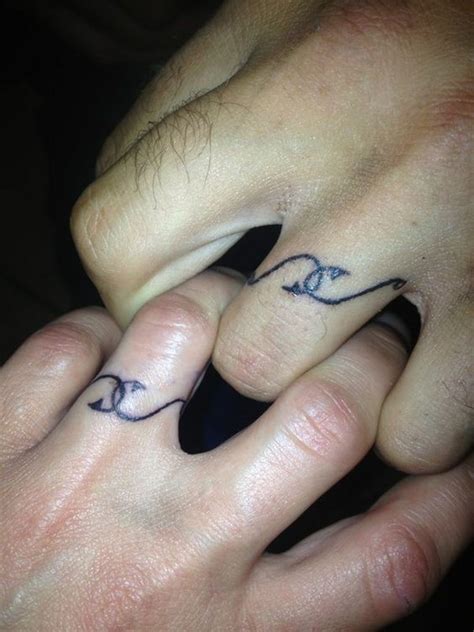 It's a great way of showing everyone how much love and affection you have devoted to one another. 40+ Sweet & Meaningful Wedding Ring Tattoos | Styletic