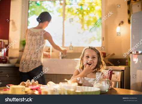 Our countertop appliances and major kitchen appliance suites are designed to help achieve all your kitchenaid is made for people who love to cook, and exists to make the kitchen a place of endless. Smiling Four Years Old Blonde Girl Sitting At The Kitchen ...