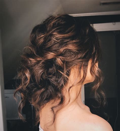 Side bangs and a pouf add all the drama and it's the one hairdo that'll go if you're going for a traditional look for your wedding reception there's probably no better hairstyle than a floral bun. Natrually curly updo, curly hair, textured updo, bridal ...