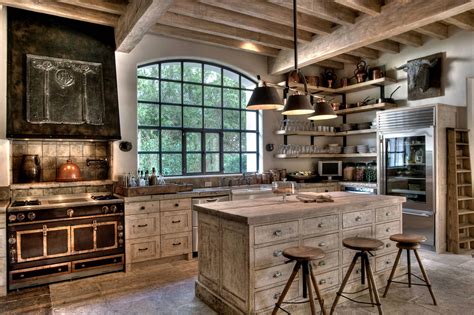 This kitchen feels almost clinical with its dominating white theme, yet the chipped white paint, exposed rafters, unpolished wood, white. Rustic Farmhouse Kitchen softened by white-washed Wood ...