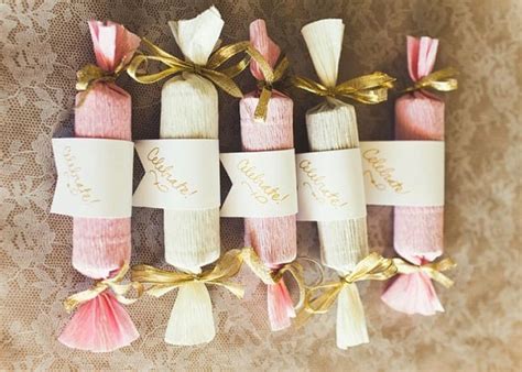 A person pulls on each end of the cracker and when the cracker breaks, a small chemical strip goes pop and the contents fall. Make It Snappy! 32 Christmas Crackers You Can Make Yourself • Cool Crafts