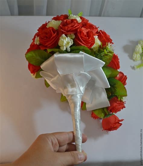 The flower expert from ubloom.com and learn how to design flowers and create fun flower projects. How to create a cascading bouquet of artificial flowers ...