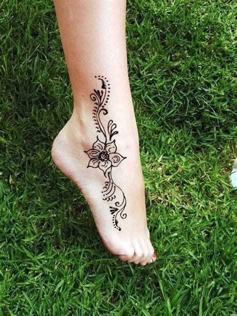 Henna is often seen on the top of the foot but it looks amazing on the side of the foot too. 100+ Striking Henna Tattoos Design for Girls - Tattoosera