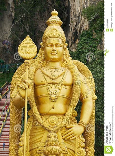 Colorful stairs of batu caves. Statue Of The Lord Murugan With The Staircase Leading To ...