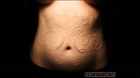 Scarifying (also scarification modification) involves scratching, etching, burning / branding, or superficially cutting designs, pictures, or words into the skin as a permanent body modification. 17+ White Ink Scarification Tattoos