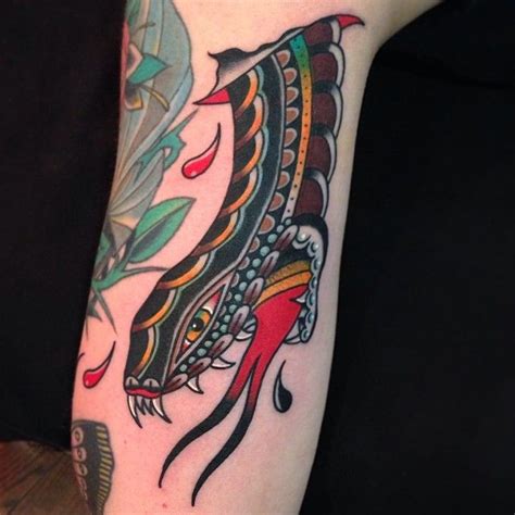 Snakehead tattoos have a lot of energy and movement. Scary snake tattoo by Nick Oaks - | TattooMagz › Tattoo Designs / Ink Works / Body Arts Gallery