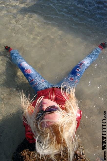 Enjoy free shipping for anthroperks members! Wet Girl in Red Jacket, Tight Jeans and High Heels by the ...