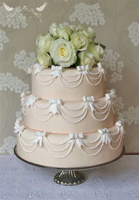 Romeo and juliet eloped and kept their marriage a secret from everyone who might consider preparing food for the wedding. Romeo & Juliet Cakes, Doris 50s tiered stacked wedding cake with pearls swags and bows, blush ...