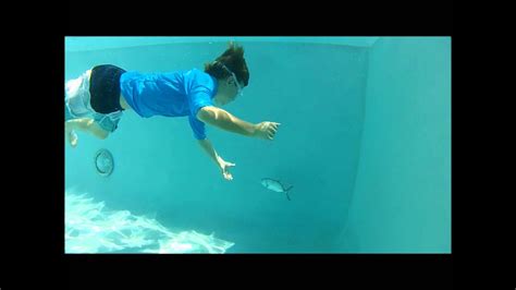 Katchakid (catch a kid) is one of the leading manufacturers of swimming pool safety equipment. Kids Hand Catching Fish in Pool - YouTube