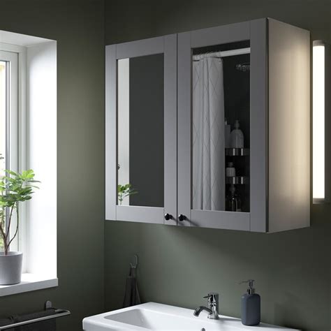 Størrelse 60x39xskapet er helt nytt og kun skrudd sammen. ENHET Speilskap med 2 dører - hvit/grå ramme - IKEA