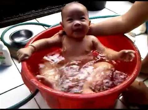 To start with, it is important you know the basics of bathing your baby. baby bath time karin 5 months old.3GP - YouTube