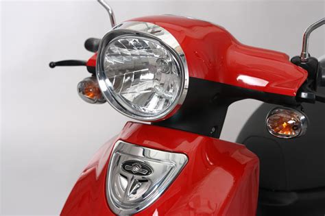 50cc scooter review found here at a low price. Red Genuine Buddy 50 headlight - New Scooters 4 Less