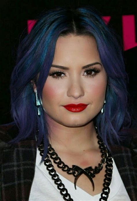 From her natural brunette to blonde to red and even blue, the 'confident' singer is always trying a new 'do. Demi Lovato | Purple hair, Purple ombre hair, Blue purple hair