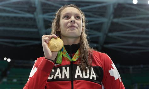 Canada's first double medalist of the games finishes with big kicks to win big. PENNY OLEKSIAK OF CANADA WINS GOLD! - In Play! magazine