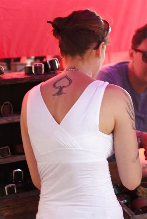 Lisa went to a tattoo parlour shop yesterday and returned home with a queen of spades tramp stamp imprinted above her left breasts. Queen of spades tattoo. | Queen of Spades | Pinterest