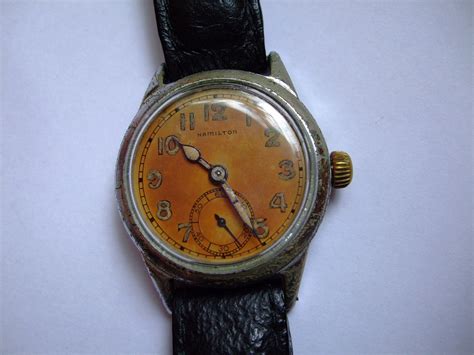 Ihre uhrenproduktion begann mit taschenuhren und sie wurden so. Hamilton Uhr 2.Weltkrieg mit kyrillischer Bodengravur ...
