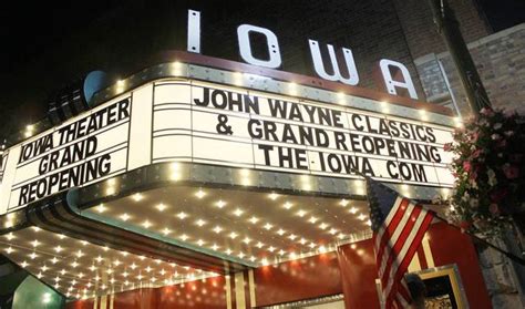 There is a movie theatre. Iowa Theatre in Winterset, IA - Cinema Treasures