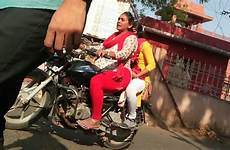 riding indian bike girl