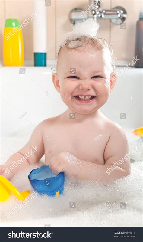 Somebody posted on one of these boards, that some sibling gave a baby like a serving of chocolate ice cream or a milkshake or something. Little Baby Girl Having Soapy Bath Stock Photo 98596811 ...