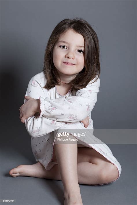 Shop for very young girls perfect for exercise, training and racing on alibaba.com. Cute Little Girl In Nightdress Smiling At Us Stock Photo ...