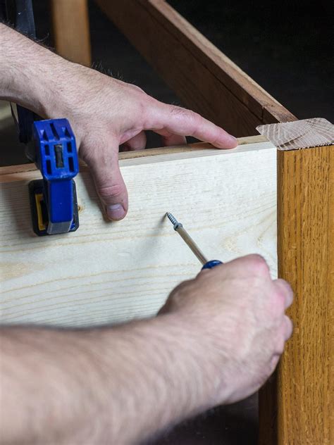 Attach the 2x4s to the bottom of the crate on each side (these will serve as the base for wheels.) cut the plywood to match the dimensions of the crate (to make a lid/seat.) cut the foam and fabric to match the. Turn an Old Coffee Table Into an Upholstered Storage ...