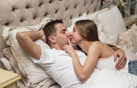 #romance #kissing #romantic #lady and the tramp #romantic kiss. Romantic couple kissing embraced in bed | Free Photo
