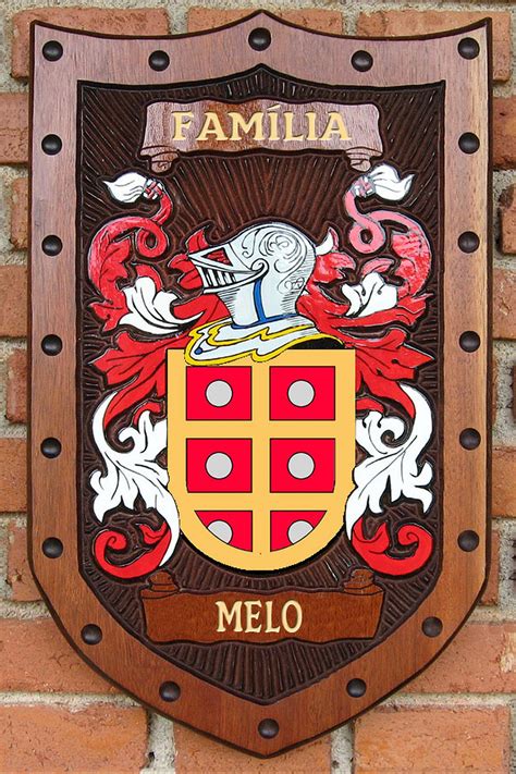 Maybe you would like to learn more about one of these? Brasão da família Melo - entalhado em Madeira - Pica-pau ...