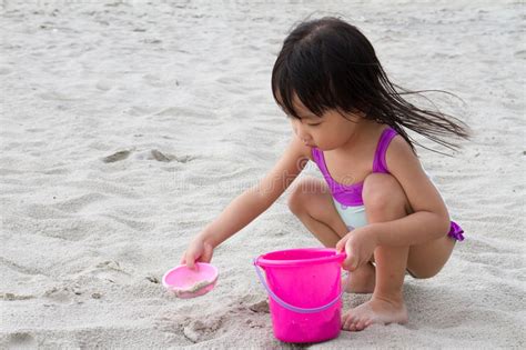 Close and play download this video. Asian Little Chinese Girl Playing Sand With Beach Toys ...