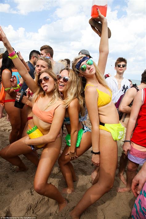 Group people flirting having nightlife. Drunken college students descend on Fort Lauderdale for ...