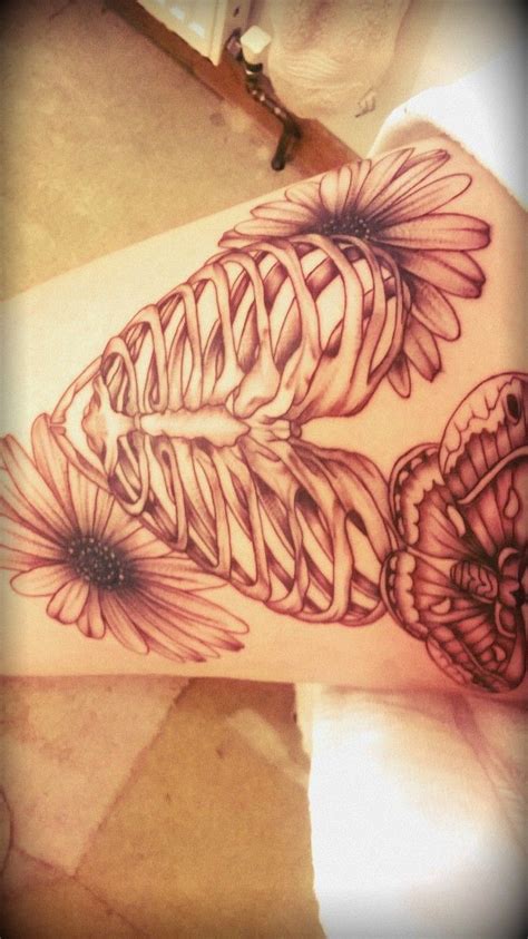 Sexiest tattoos for women the sexiest tattoo i've ever seen was some text that ran along a woman's rib cage. Heart rib cage tattoo, daisy tattoo, moth tattoo, leg ...