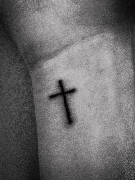 It may be small, yet looks solidly strong. Small cross tattoo on wrist | Tattoos | Pinterest | Cross ...