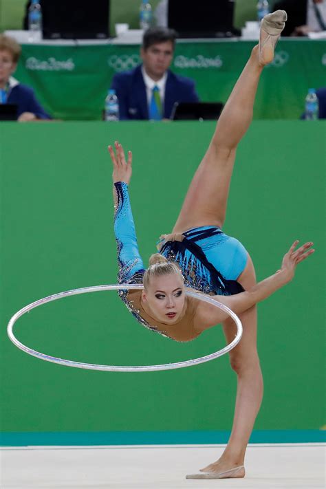 Performances are held on a 13m x 13m mat, with different formats for individual and group competitions. 36 Rhythmic Gymnastic Photos — Rhythmic Gymnastics at Rio ...