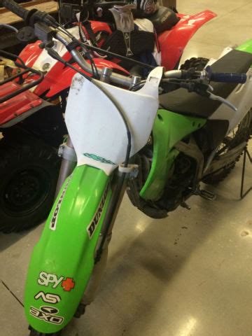While the bike's nature is clearly intended for racing purposes, it therefore lacks a headlight and blinkers, being thus illegal for street use. 2005 Kawasaki KX 250f Dirt Bike Motorcycle Motocross 4 Stroke