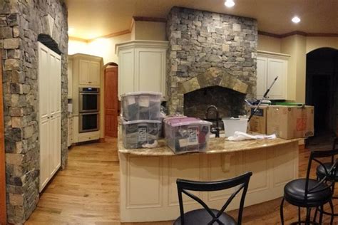 Nantahala cottage is a small cottage style floor plan with a loft, stone fireplace and open deck. Garrell Associates Nantahala Cottage Gable