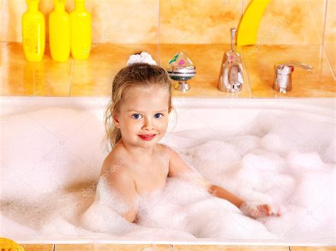 A selection of great bath toys for toddlers. Child washing in bubble bath . — Stock Photo © poznyakov ...