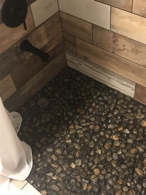 This shower floor made up of rocks. : mildlyinteresting