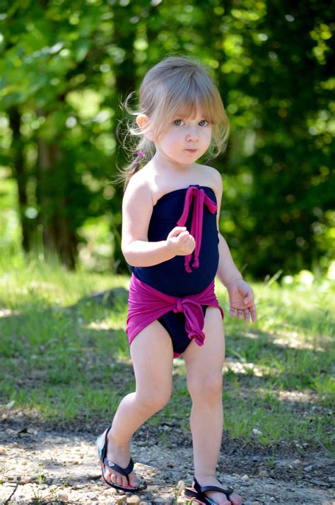 4.5 out of 5 stars. Girls Bathing Suit Dark Navy w/ Fuchsia Wrap Around ...