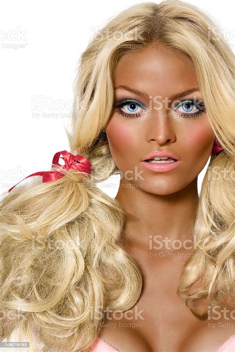 Movies, books, tv shows, our culture's whole gamut of popular culture mediums have stereotyped the sign of blonde hair into an obvious sign of beauty, of sexuality, of attractiveness Very Tanned Blond Woman Stock Photo - Download Image Now ...