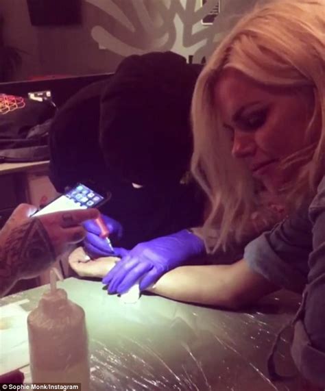 Black and gray tattoos are less painful (and. Sophie Monk winces in pain as she gets wrist tattoo and ...