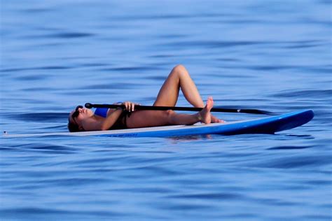 How much does it cost to move to hawaii? Miss Australia KYARA COAKES in Bikini Paddling in Hawaii ...