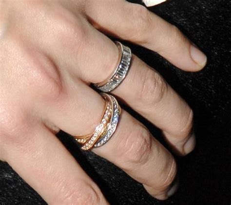 Kelly's engagement ring accompanied her in her last ever appearance on film. Updated Celebrity Rings!!! | Rolling ring, Katie holmes and Cartier