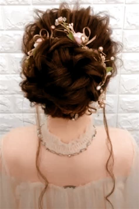 With seasonal flowers, fabrics, and various builds, building a simple, chic rustic arbor yourself isn't difficult at all with a easy diy. read article Messy bridal bun hairstyle for long hair tutorial. in 2020 ...
