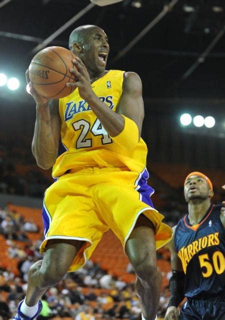 The official kobe bryant fb page. Kobe Bryant says hey as he grabs the ball in the air.JPG