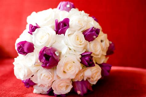 Come with 8 long flexible wired stems, which is easy to install, bend or trim. Wedding bouquet with white roses and purple tulips with rh ...