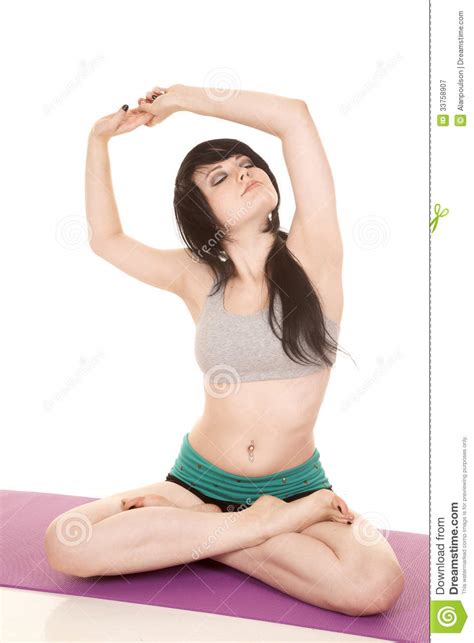 She could also playfully bite her finger as a. Woman Gray Sports Bra Sit Arms Over Head Stock Image ...