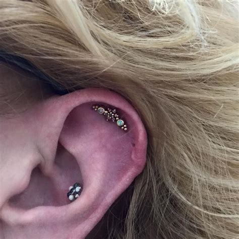 The triple helix piercing will also give the attractive look rather than the strange look. Triple helix piercing with gold jewelry from Body Gems and ...