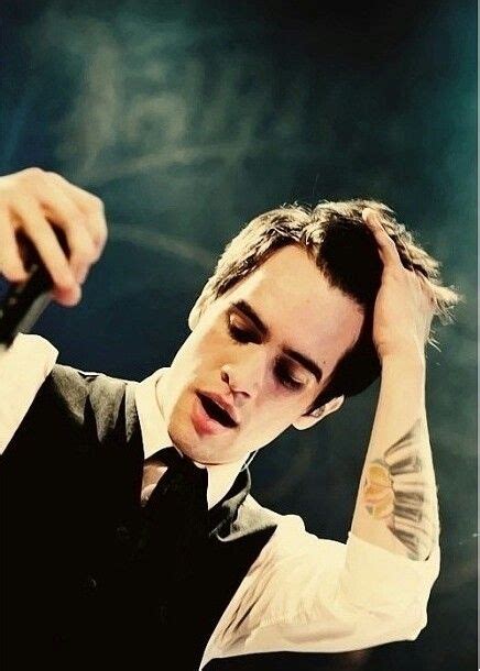 Maybe you would like to learn more about one of these? Brendon Urie.... the famous fingers through his hair thing ...