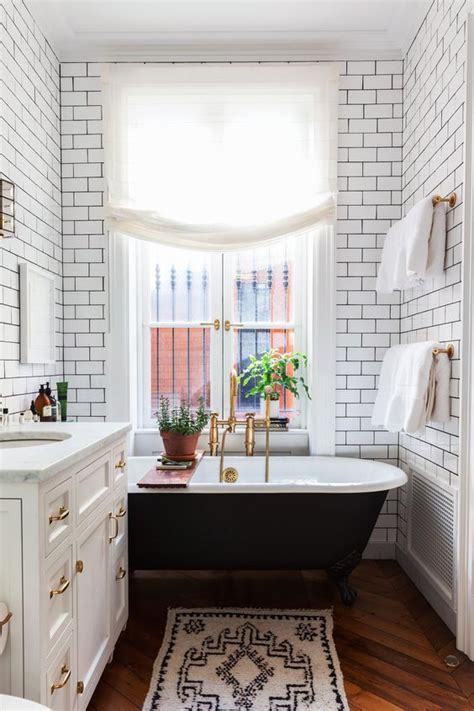 In this case, the tiles are white, so the dark wood around the mirror and the black faucet and drawer pulls offers a nice contrast. 20 Stunning Art Deco Style Bathroom Design Ideas | Home ...